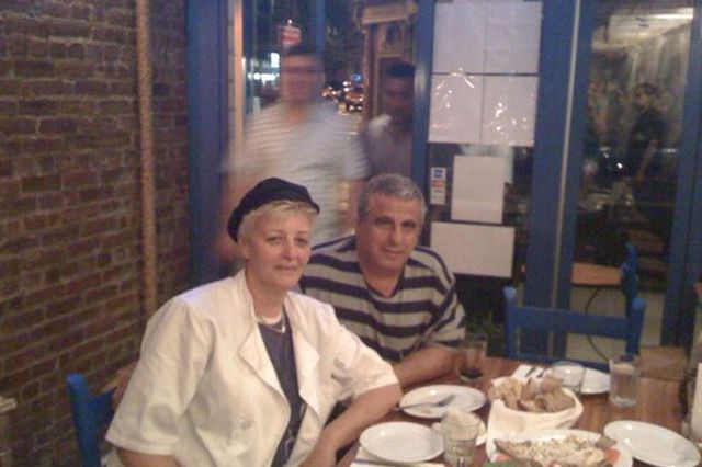 Douralas, in the hat, at Santorini Grill